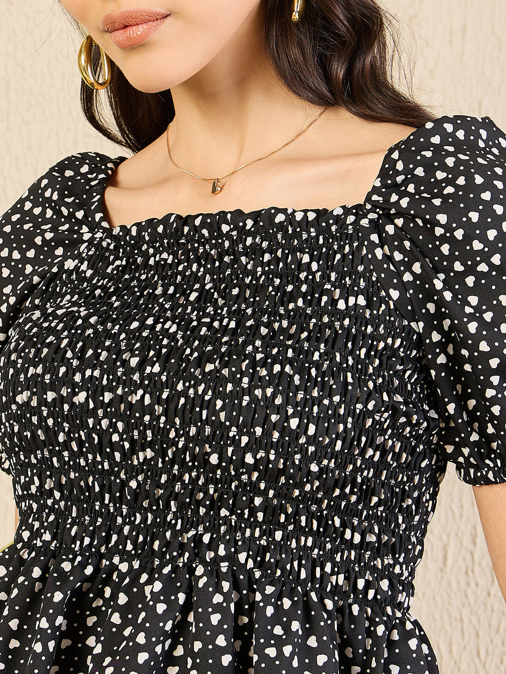Smocked Peplum Top